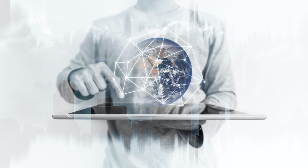 man-using-digital-tablet-with-global-network-connection-technology-hologram-1024x558-1.jpg